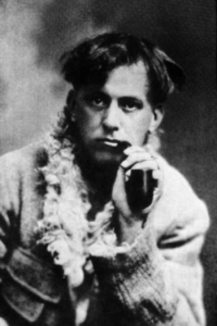 A young Aleister Crowley enjoying his pipe.