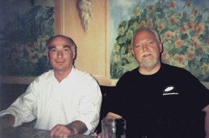 Ken Campbell (left) reunited with Robert Anton Wilson in a café in London. Photo © James Nye 1992.